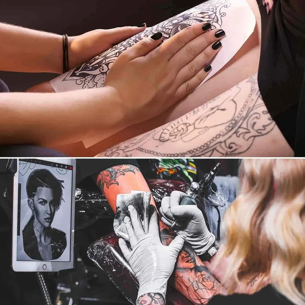 Hands applying a skin transfer kit to a client's skin during a professional tattoo practice session.
