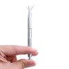 A hand holds a silver precision 4-prong gem and small parts grabber tool with fine tips.