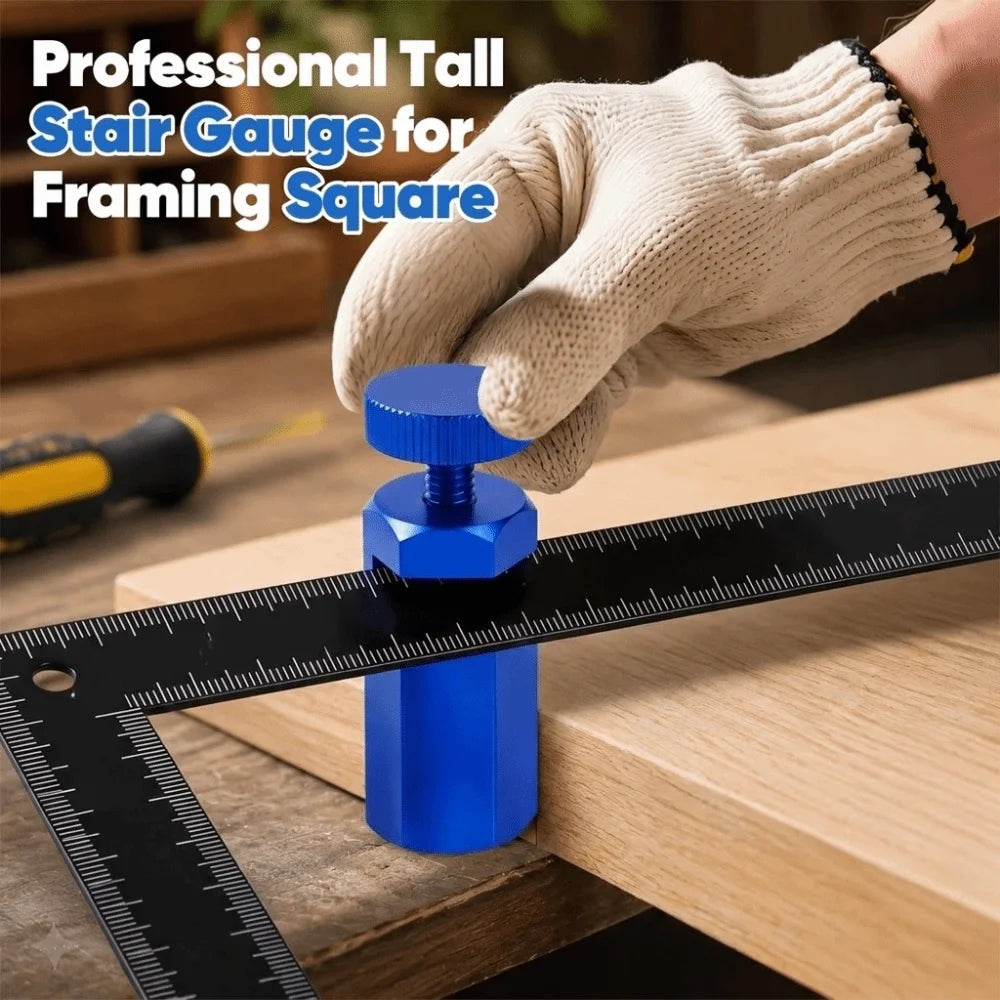 A hand wearing a tan glove holds a blue stair gauge against a black measuring square on a wooden surface.