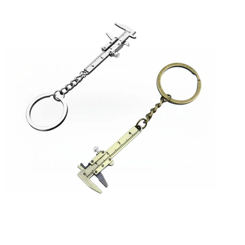A precision metal jewelry measuring ruler and caliper keychain with a chain and a circular loop.