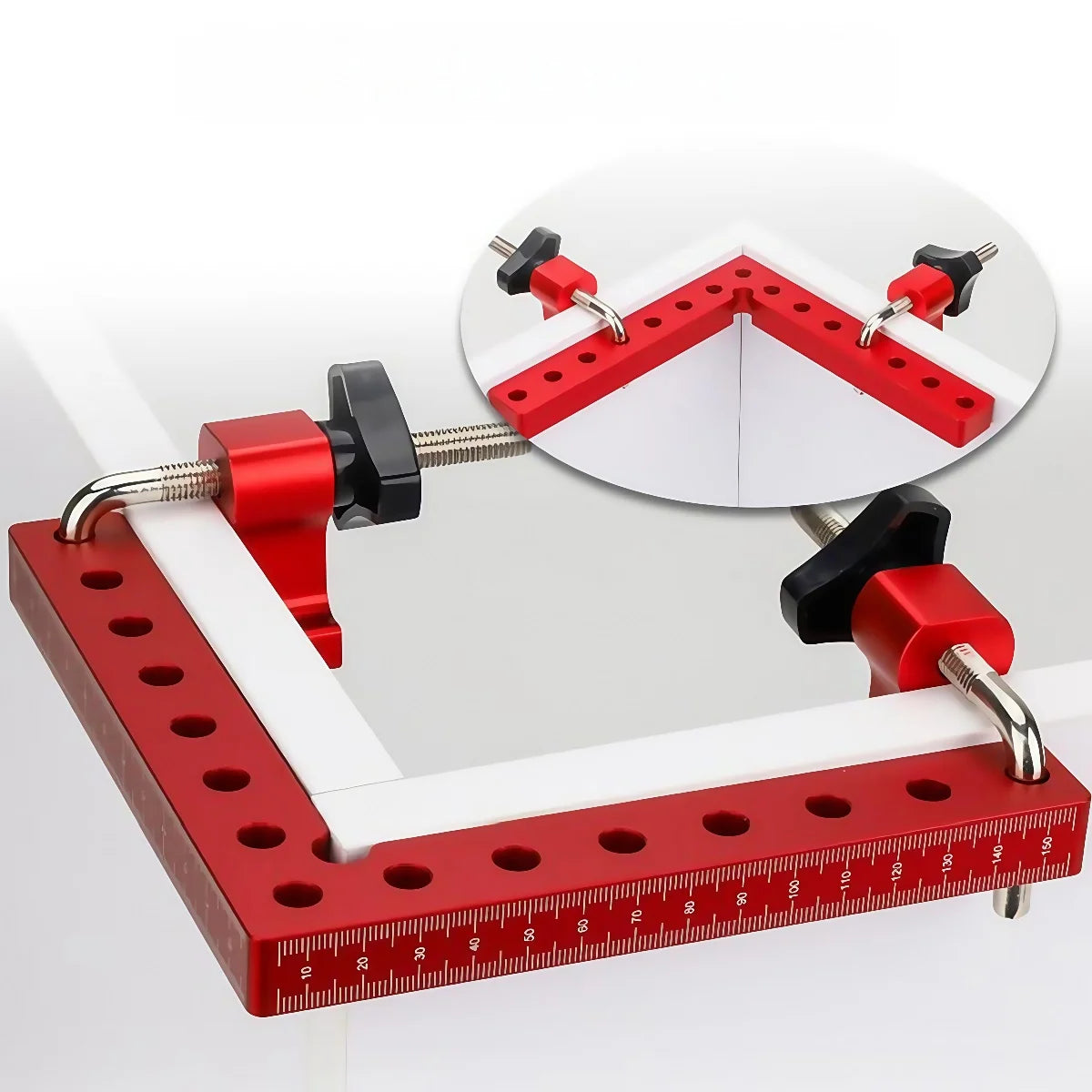 A precision woodworking right angle clamp shown in red and black, used for securing wood pieces at a 90-degree angle.