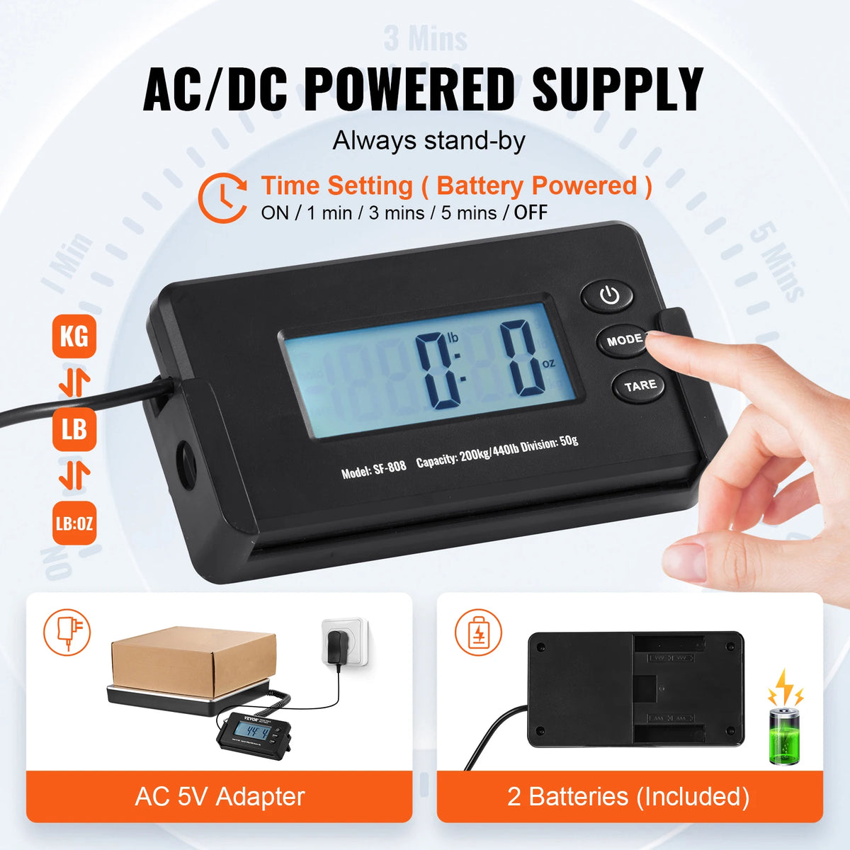 Black AC/DC powered digital shipping scale with a display, power adapter, and two included batteries.
