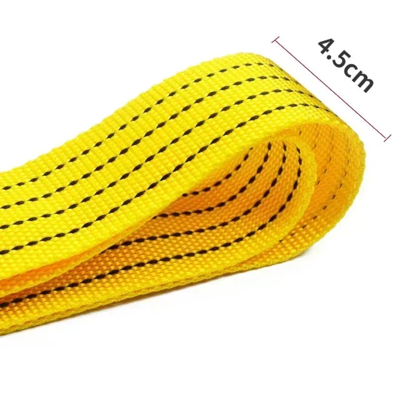 Yellow heavy duty tow rope measuring 4.5cm coiled and laid out.