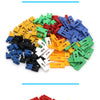 A collection of various colored jumper cap connectors and through hole components.