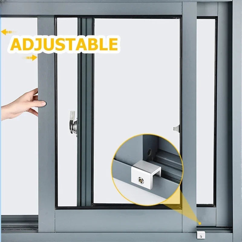 A hand adjusts an adjustable sliding window sash lock stopper mechanism on a gray window frame.