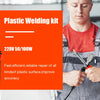 A man uses a plastic welding kit soldering iron to repair a car part.