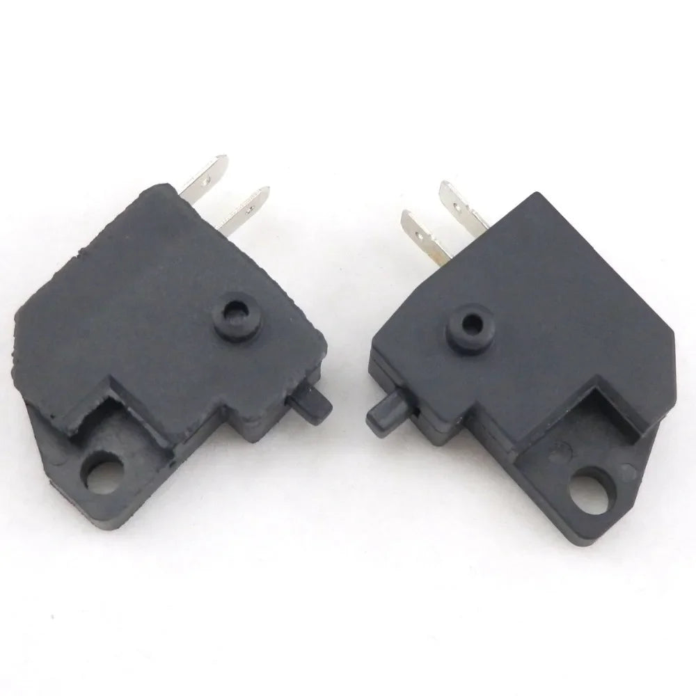 A pair of black universal motorcycle and scooter brake light switches with metal pins.