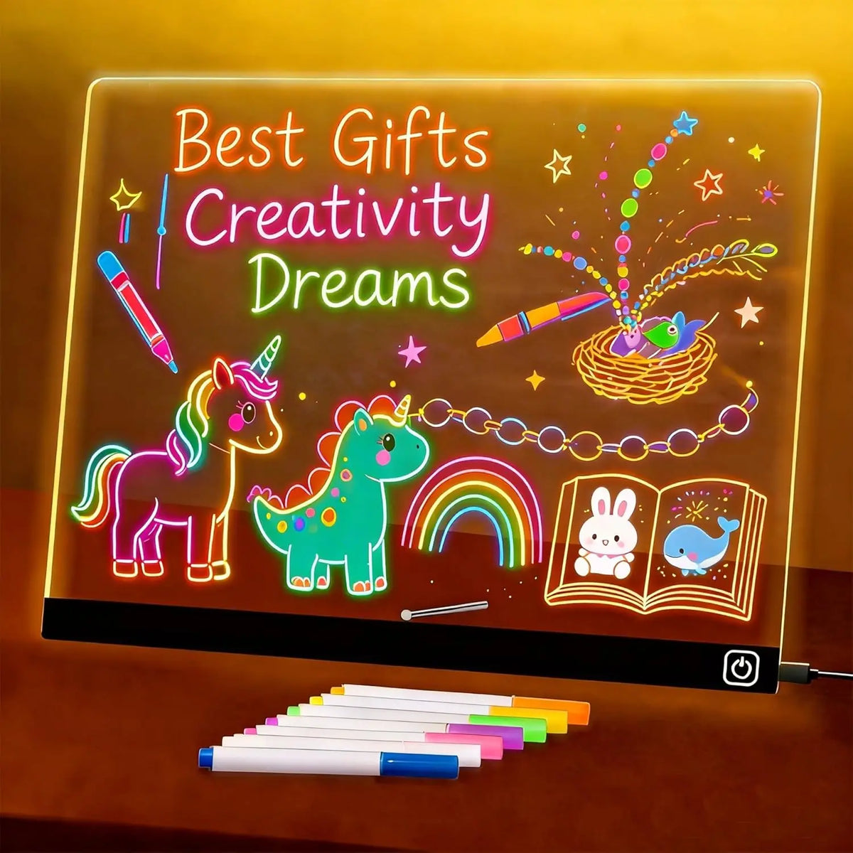 An LED acrylic message board displays colorful drawings of a unicorn, a rainbow, and a book with a rabbit and a fish.