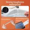 Hands demonstrate the strong toughness and waterproof nature of transparent double-sided adhesive tape on a sink surface and 