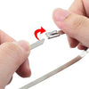 A hand is using pliers to tighten a heavy duty stainless steel cable tie.