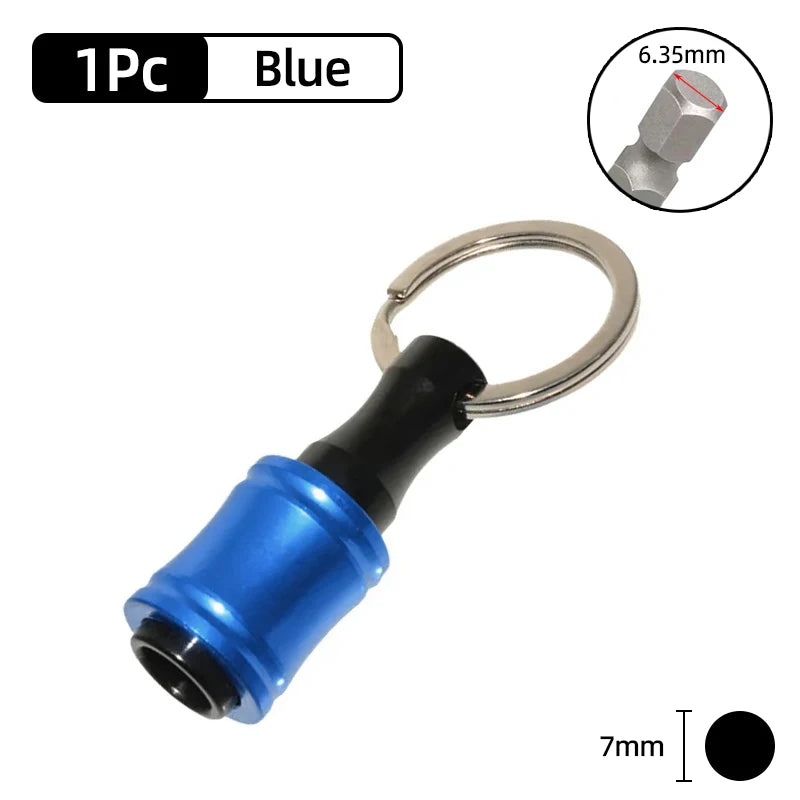 A blue screwdriver bit holder with a metal loop and a hexagonal shaft, shown next to a measurement scale.