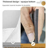 A hand is holding a section of thickened, opaque black grille panel for self-adhesive wall decor.