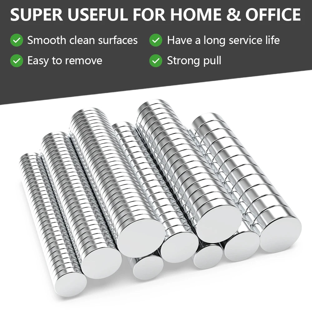 A collection of silver refrigerator magnets showing various sizes and finishes.