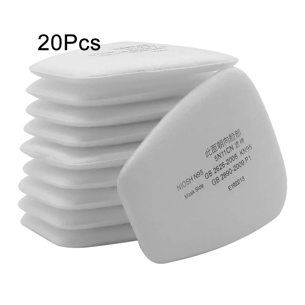 A stack of 20 high-performance dust filter cotton masks for gas masks, showing the mask side.