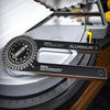A precision aluminum angle finder tool with a degree scale and a single cut feature is shown on a workbench.
