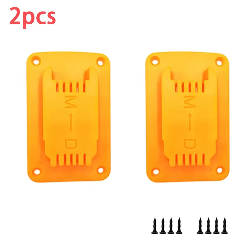 Two orange heavy duty electric tool holder racks with slotted openings and mounting holes.