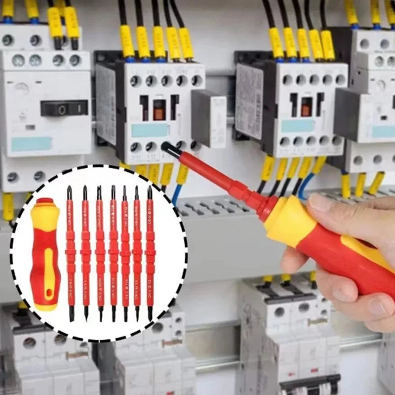 A hand is using a red screwdriver to work on electrical components in a panel with multiple insulated tools.