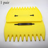 A pair of yellow plastic leaf grabbers or rakes for yard cleaning