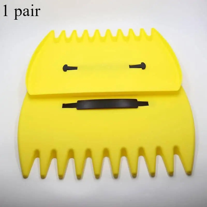 A pair of yellow plastic leaf grabbers or rakes for yard cleaning