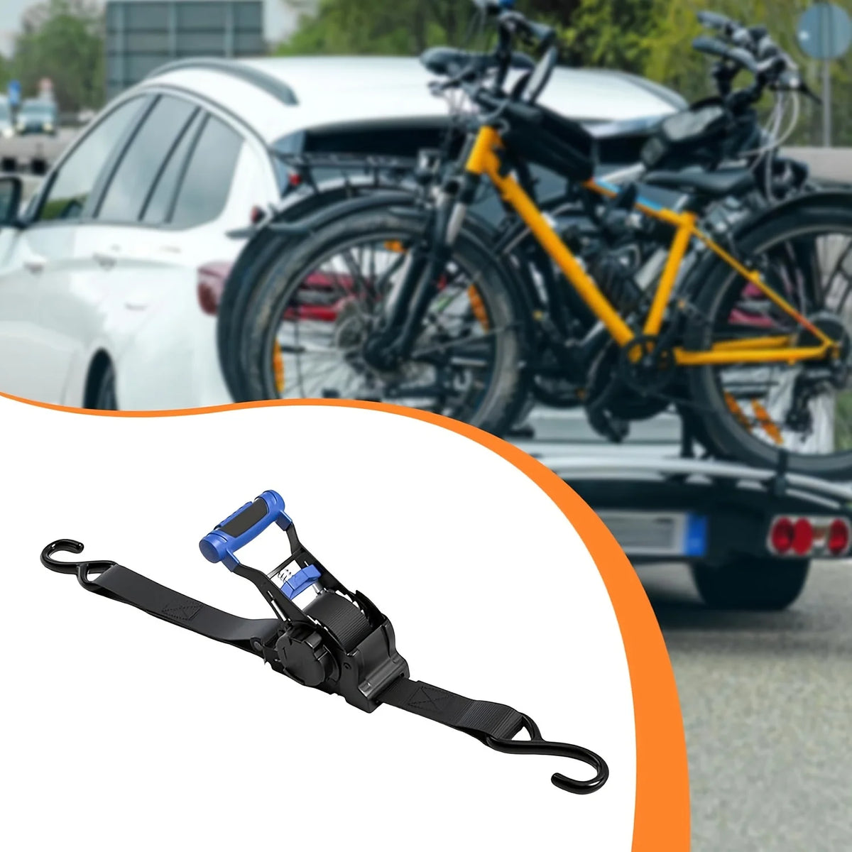 Black and blue retractable ratchet tie-down strap used for securing cargo.