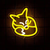 A glowing neon outline of a fox face hangs against a dark background.