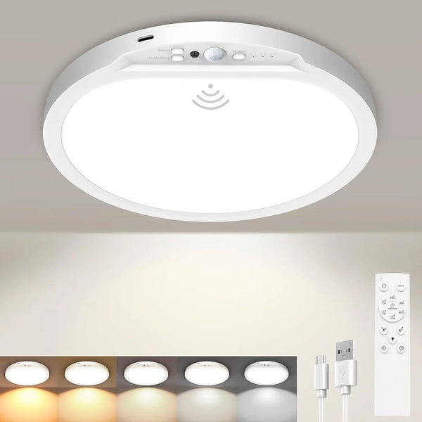 A white wireless motion sensor ceiling light fixture is mounted on a ceiling, with several recessed lights visible below.