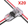 A close-up view of X20 T-Tap wire connectors with red and black wires.