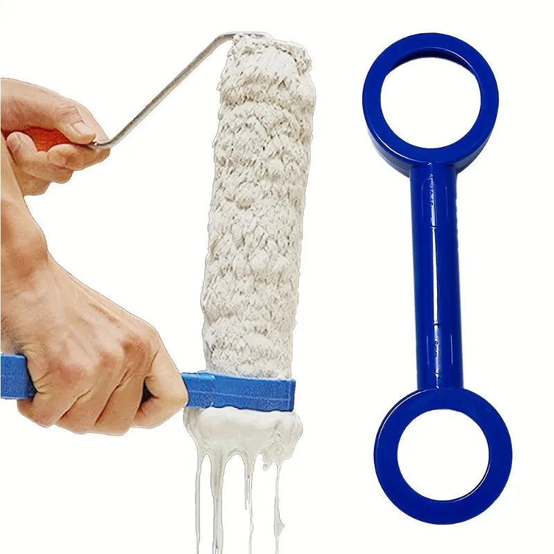 A hand is using a multi-surface paint scraper tool to remove dried paint from a surface.