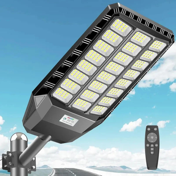A flood light fixture mounted on a pole, designed for solar motion sensor security lighting.