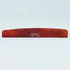 A wooden acoustic guitar bone bridge saddle with the inscription Guyker ATR-7631