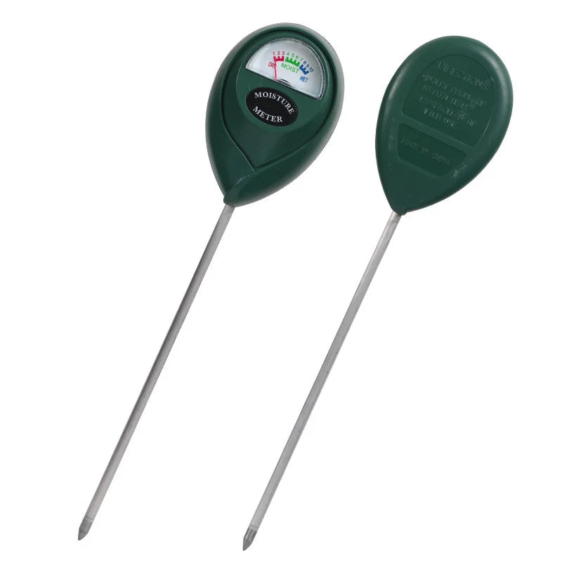 A green portable soil moisture meter with a long probe for measuring moisture in plants and gardens.