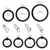 A collection of black silicone erection enhancer rings shown in various sizes and shapes.