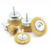 A set of three brass wire brushes with metal handles used for rust removal and polishing.