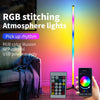 An RGB stitching atmosphere light standing on a floor, illuminating a room.