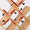 A precision woodworking right angle clamp made of light wood and red metal hardware.