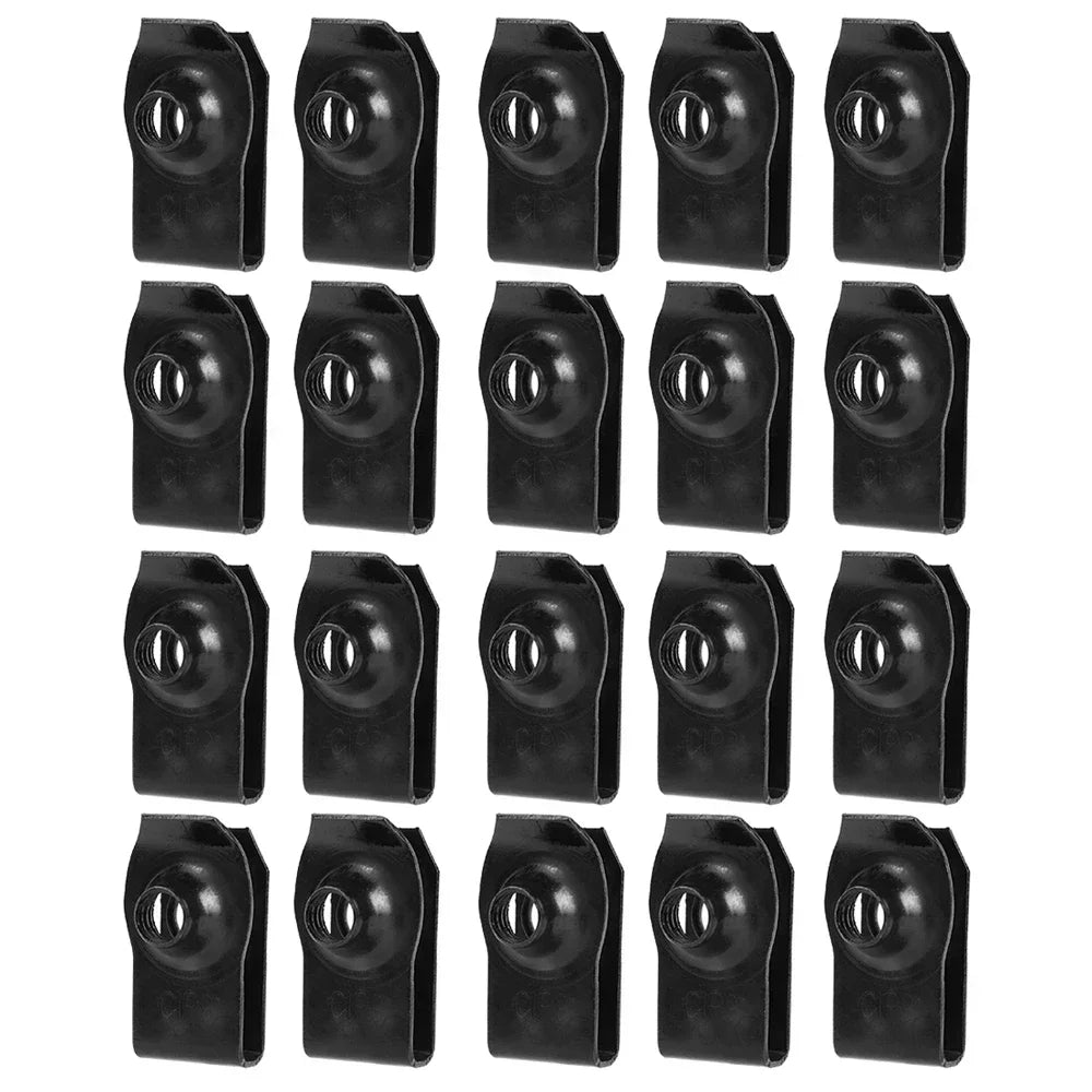 A row of black U-type body bolts and clips for auto fastening.