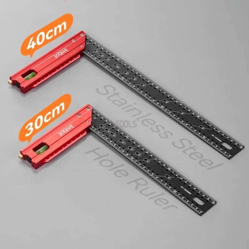 A set of precision stainless steel measuring rulers, including a 40cm and 30cm ruler.