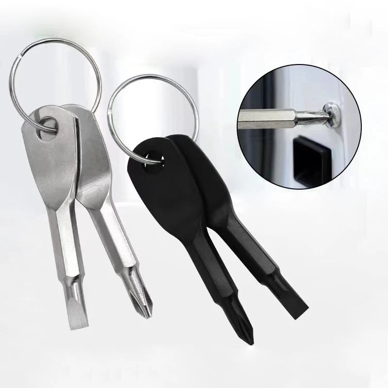 A pair of black and silver mini screwdrivers with metal keychains shown next to a close-up of a screwdriver head.