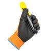 A hand wearing a black work glove is holding a yellow plastic tool or implement.