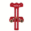 A red precision thin rip jig for table saws with a millimeter scale.