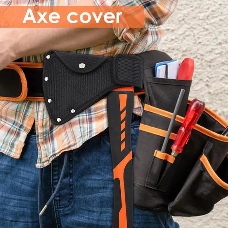 Black nylon axe blade cover attached to a belt, shown against a plaid shirt and denim background.