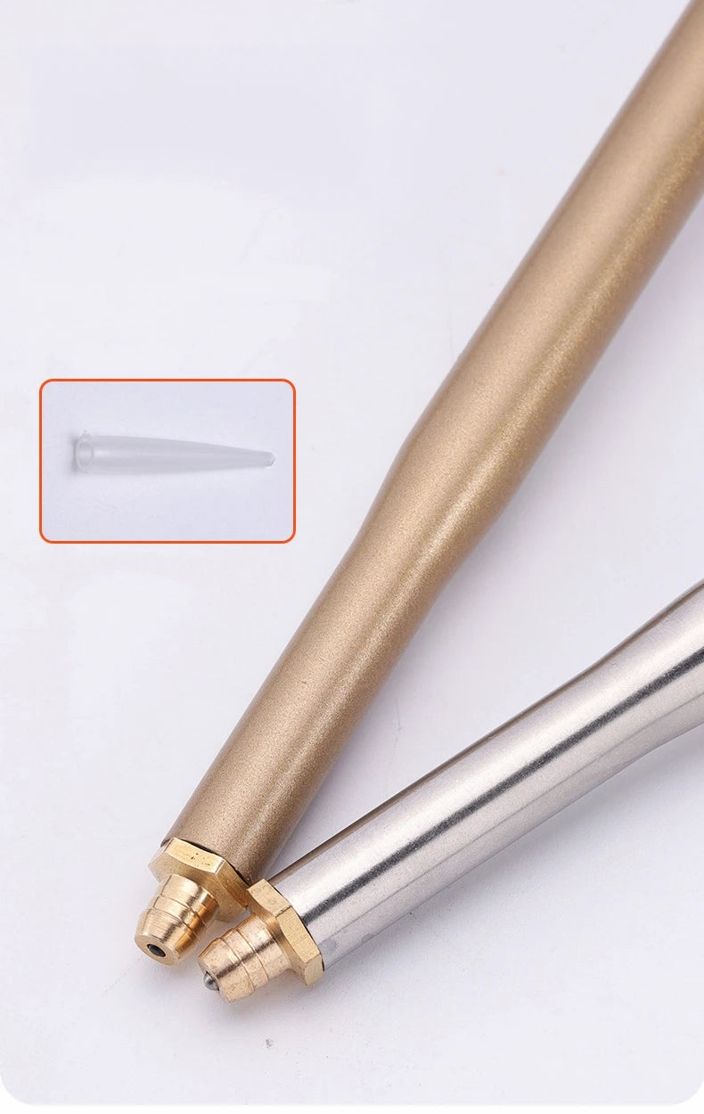 Close-up view of a professional PU foam sealant spray gun with a gold finish and a clear tip.