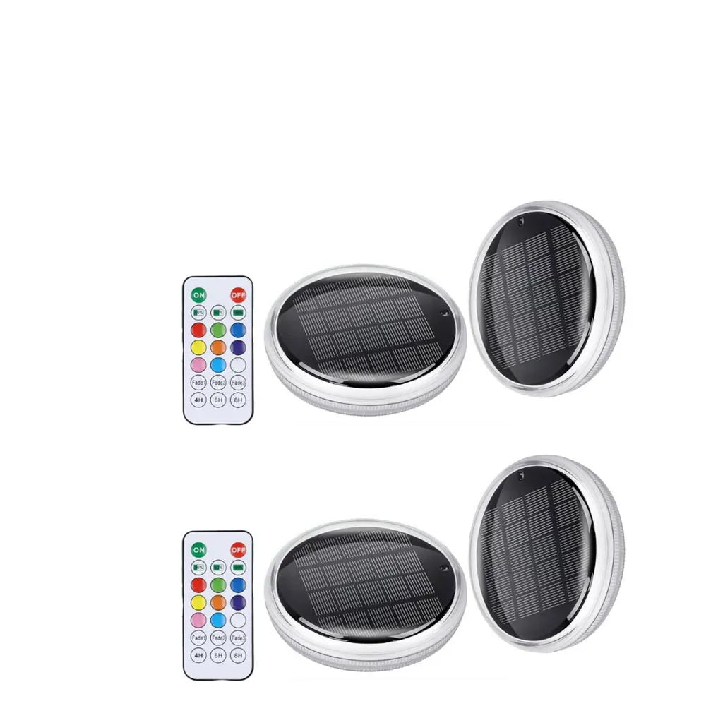 A set of solar floating pool lights and a remote control for underwater lighting.