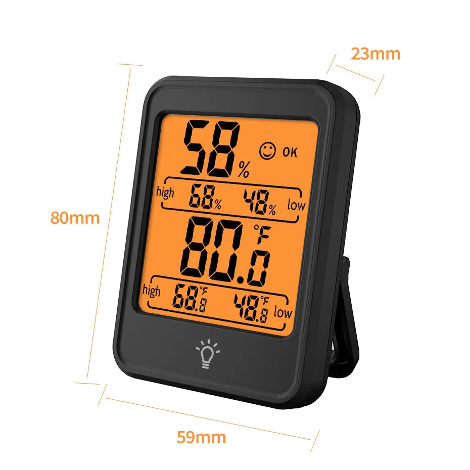 A black portable digital thermometer and hygrometer displaying a temperature of 80.0 degrees Fahrenheit.