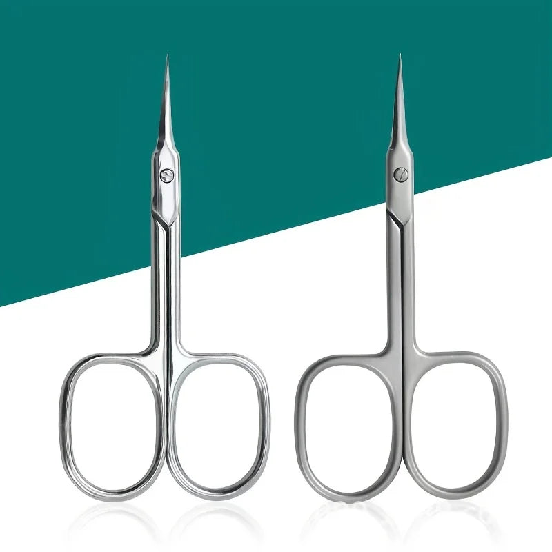 A pair of precision stainless steel cuticle and nail clippers shown against a teal background.