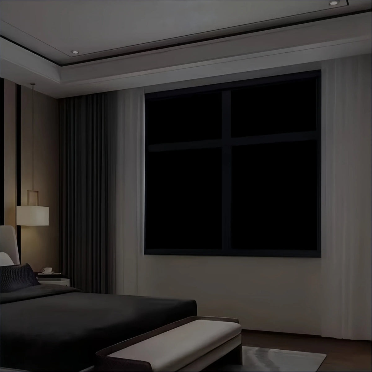 A modern bedroom interior featuring a large window covered with dark blackout film.