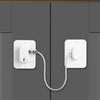 A white universal door and window safety lock is installed on a gray cabinet door.