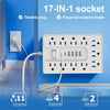 A white 17-IN-1 socket power strip with multiple outlets and USB ports mounted on a blue wall.