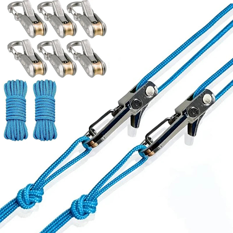A set of heavy-duty blue retractable tie down ropes and metal clasps for securing items.
