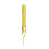 A gold-colored automatic centre punch tool with a sharp point.